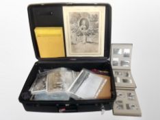 A suitcase containing photograph albums,