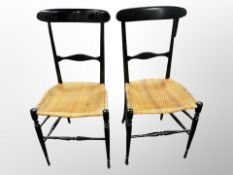 A pair of 20th century Danish ebonised and rattan chairs