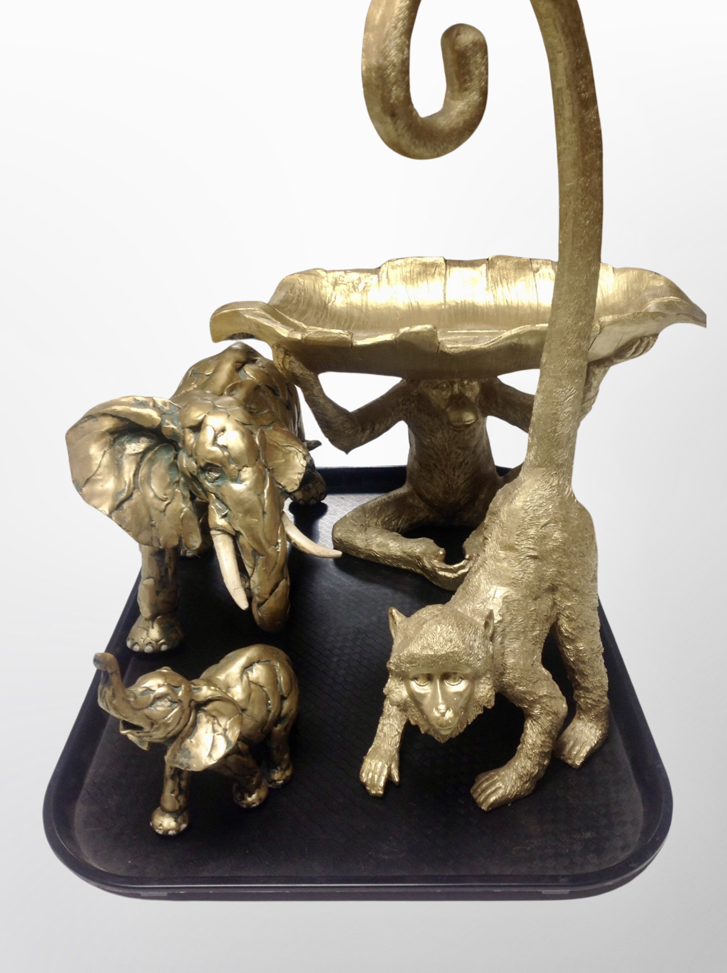 Four contemporary gilt resin monkey and elephant figures,