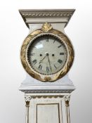 A 19th century painted and gilt Scandinavian drum head longcase clock with pendulum, no weights,