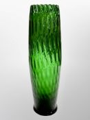 A large green glass vase,