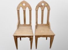 A pair of pitch pine ecclesiastical chairs