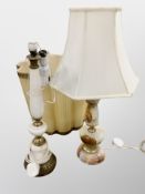 A brass and marble lamp base and a further onyx example