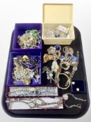 A collection of costume jewellery to include lady's quartz wristwatches, brooches, bead necklaces,