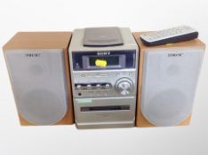 A Sony micro hifi system with speakers and a further pair of speakers
