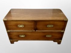A mahogany brass mounted campaign style three drawer low chest,