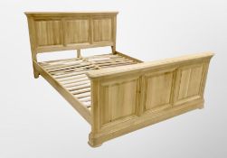 An Oak Furniture Land contemporary oak 5' bed frame