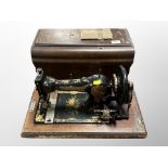 A Jones sewing machine numbered 49649 in case