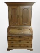 A 19th century stained oak secretaire bookcase,