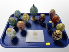 Twelve Franklin Mint House of Fabergé enamelled eggs