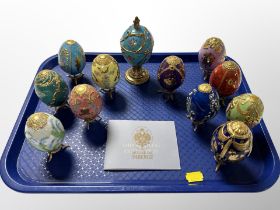 Twelve Franklin Mint House of Fabergé enamelled eggs