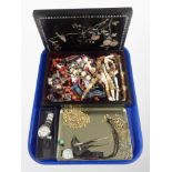 A Japanese lacquered and mother of pearl inlaid jewellery box containing assorted bead necklaces,