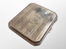 A silver cigarette case with engine turned decoration CONDITION REPORT: 85.