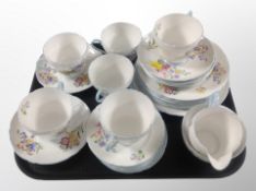 Twenty eight pieces of Shelley find bone tea china decorated with flowers