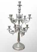 An ornate silvered candelabrum height 83 cm