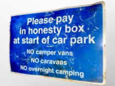 An enamelled parking sign,