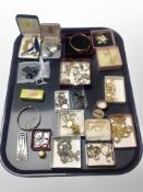 A collection of costume jewellery including gold plated bangles, necklaces, Celtic crucifix pendant,