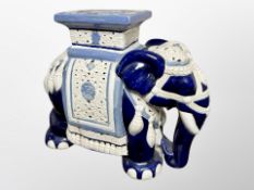 A ceramic elephant plant stand,