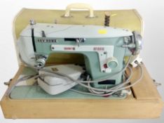 A New Home electric sewing machine,