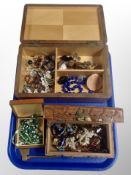 A teak jewellery box and two others containing costume jewellery, beaded necklaces,