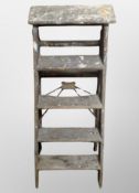 A vintage wooden step ladder