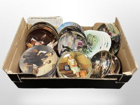 A box of Norman Rockwell collector's plates