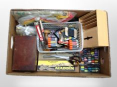 A box of threads, upholstery scissors,