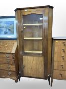 A reproduction mahogany display cabinet,