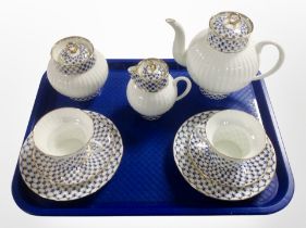 A Russian blue and gilt porcelain tea for two