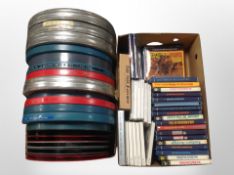 Two boxes of vintage film reels