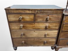 A Victorian mahogany five drawer chest,