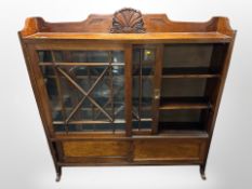 A Victorian style glass sliding door bookcase,