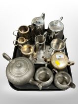 A hammered pewter three-piece tea service,