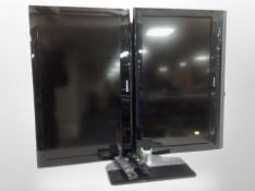 A Samsung 32 inch lcd tv and a Sony 32 inch lcd tv with remotes