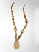 A carved bone necklace