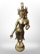 A Thai brass figure,