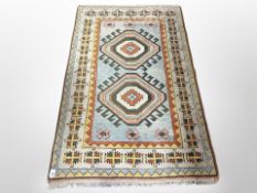 A Caucasian polychrome rug,