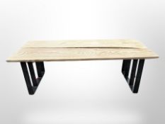 An industrial style steel and pine table,