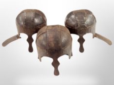Three Viking style steel helmets