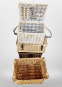 Four wicker baskets / hampers
