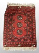 A small Afghan Bokara rug 73 cm x 51 cm