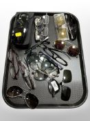 A collection of sunglasses,
