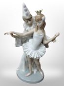 A Lladro figure - Harlequin and Ballerina dancing,