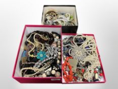 Three boxes of costume jewellery, necklaces, faux pearls,