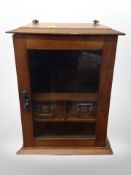A Victorian oak smoker's cabinet,