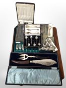 A tray of boxed cutlery sets, silver napkin ring, pair of fish servers,