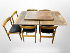 A set of six Danish teak and black vinyl dining chairs together with a non-matching teak extending