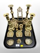 Three pairs of brass candlesticks, further easel frame,