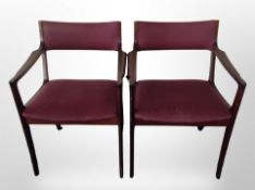 A pair of 20th century Danish stained teak armchairs,