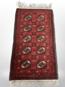 An Afghan Bokara rug 115 cm x 55 cm